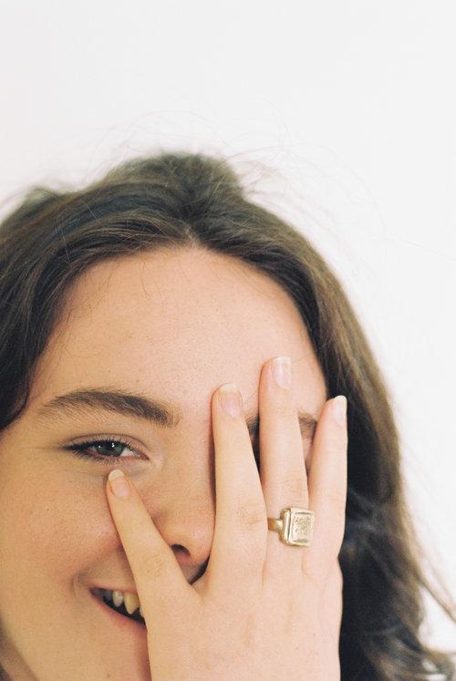 Lucinda Barrett Hold my hand signet ring Bronze